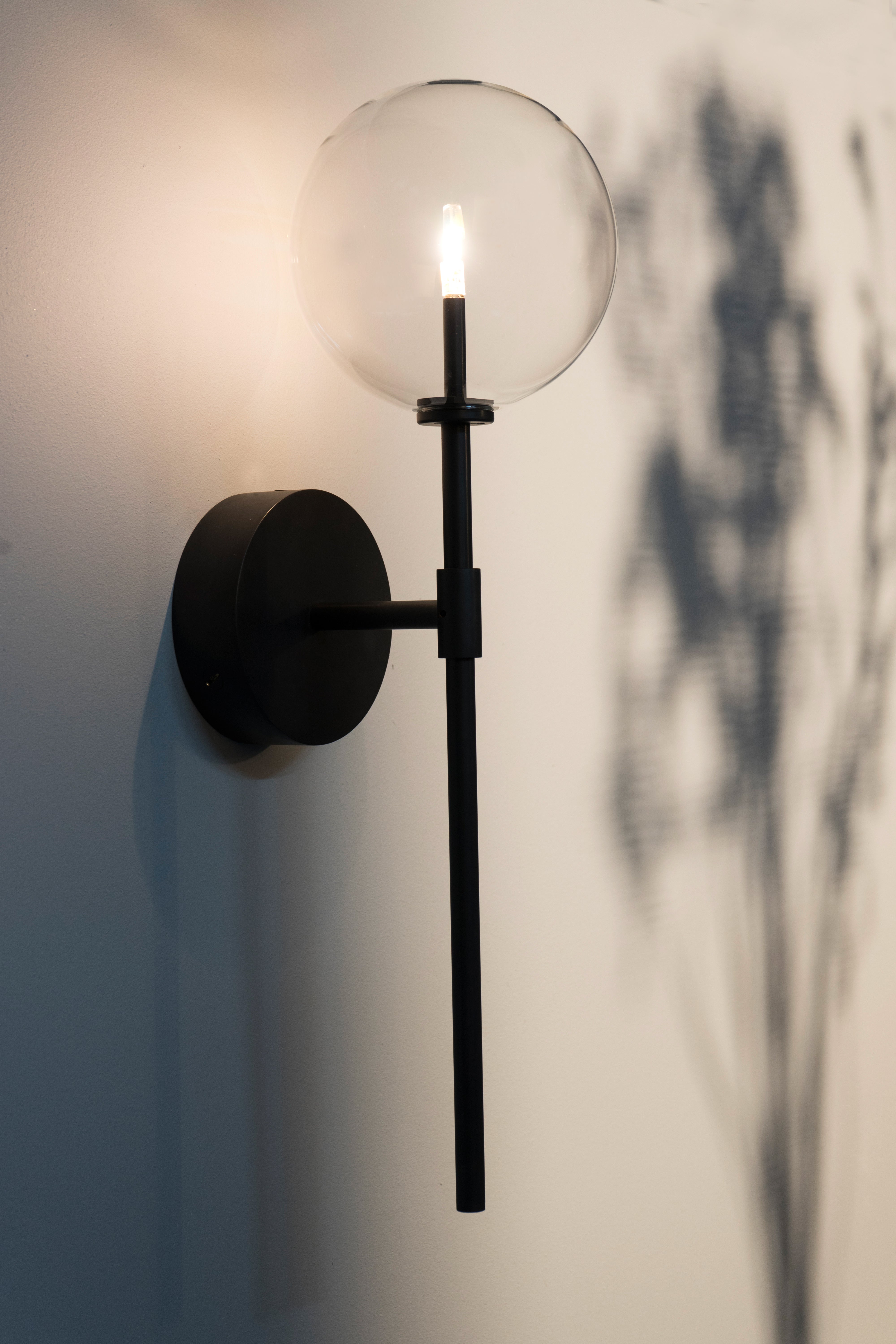 Schwung Dawn Single Black Gunmetal Transparent Globe Wall Light